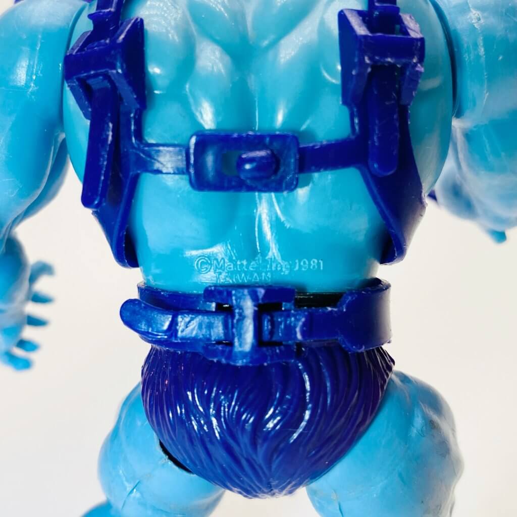 MOTU, Les Maîtres de l'Univers, Skeletor. Vue de dos, zoom sur la marque.